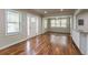 Hardwood floor living room with an open floor plan and neutral wall colors at 1790 Ledo Ave, Decatur, GA 30035