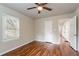 Spacious bedroom featuring hardwood floors and an adjacent bathroom at 1790 Ledo Ave, Decatur, GA 30035