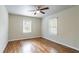 Bright bedroom with hardwood floors and ceiling fan at 1790 Ledo Ave, Decatur, GA 30035
