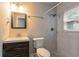 Modern bathroom with a shower, toilet, and vanity at 1790 Ledo Ave, Decatur, GA 30035