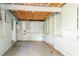 Unfinished basement with open space and concrete floor at 1790 Ledo Ave, Decatur, GA 30035