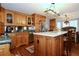 Spacious kitchen with an island and wood cabinets at 8710 Mount Rushmore Dr, Alpharetta, GA 30022