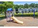 Community playground with swings and a slide at 2357 Bayrose Cir # 57B, East Point, GA 30344