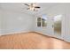 Bright bedroom with ceiling fan and door to patio at 2357 Bayrose Cir # 57B, East Point, GA 30344