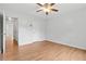 Bright bedroom with ceiling fan and wood-look floors at 2357 Bayrose Cir # 57B, East Point, GA 30344