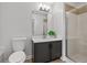 Bathroom features vanity, toilet and shower/tub combo at 2357 Bayrose Cir # 57B, East Point, GA 30344