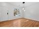 Bright dining room with wood flooring and natural light at 2357 Bayrose Cir # 57B, East Point, GA 30344