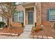 Townhouse entry with landscaping and steps at 2357 Bayrose Cir # 57B, East Point, GA 30344