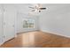 Well-lit bedroom with hardwood floors and ceiling fan at 2357 Bayrose Cir # 57B, East Point, GA 30344