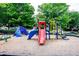 Community playground with slides, climbing features, and swings at 2357 Bayrose Cir # 57B, East Point, GA 30344