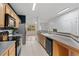 Modern kitchen with stainless steel appliances and granite counters at 2357 Bayrose Cir # 57B, East Point, GA 30344