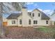 Back of house, showcasing a large yard and a spacious layout at 114 Arborwood Way, Temple, GA 30179