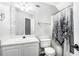 Bathroom with white vanity and shower/tub combo, featuring a tree-themed curtain at 114 Arborwood Way, Temple, GA 30179