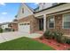 House exterior features stone accents and a welcoming front porch at 474 Haley Se St, Marietta, GA 30060