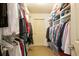 Large walk-in closet with ample shelving and hanging space at 1595 Water Vista Ct # 4301, Cumming, GA 30041