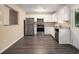 Updated kitchen with stainless steel appliances and granite countertops at 2887 Rockcliff Se Rd, Atlanta, GA 30316