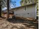 Rear view of house exterior, showcasing a wooden deck at 2887 Rockcliff Se Rd, Atlanta, GA 30316