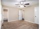 Large main bedroom with neutral carpeting and access to the bathroom at 2887 Rockcliff Se Rd, Atlanta, GA 30316