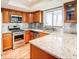 Modern kitchen with granite countertops and stainless steel appliances at 12 Rumson Ct, Smyrna, GA 30080