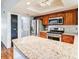 Modern kitchen with granite countertops and stainless steel appliances at 12 Rumson Ct, Smyrna, GA 30080
