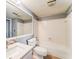 Clean bathroom with a bathtub, toilet, and updated vanity at 12 Rumson Ct, Smyrna, GA 30080