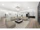 Finished basement with large sectional sofa and wet bar at 2251 Old Atlanta Rd, Cumming, GA 30041