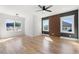 Bright bedroom with hardwood floors and large windows at 2251 Old Atlanta Rd, Cumming, GA 30041