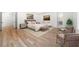 Spacious primary bedroom with hardwood floors and sitting area at 2251 Old Atlanta Rd, Cumming, GA 30041