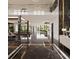 Stunning entryway with high ceilings, marble floors, and modern light fixtures at 2251 Old Atlanta Rd, Cumming, GA 30041