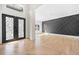 Elegant entryway with double doors and hardwood floors at 2251 Old Atlanta Rd, Cumming, GA 30041