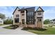 Brick two-story home with a grand entrance and landscaping at 2251 Old Atlanta Rd, Cumming, GA 30041