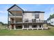 Stunning two-story home with a large deck and backyard at 2251 Old Atlanta Rd, Cumming, GA 30041