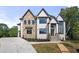 Stunning two-story home with stone and brick exterior at 2251 Old Atlanta Rd, Cumming, GA 30041
