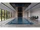 Luxury indoor pool with elegant design and large windows at 2251 Old Atlanta Rd, Cumming, GA 30041