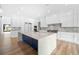 Gourmet kitchen with a large island and white cabinetry at 2251 Old Atlanta Rd, Cumming, GA 30041