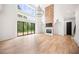 Spacious living room with high ceilings, fireplace and large windows at 2251 Old Atlanta Rd, Cumming, GA 30041