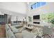 Open living room with high ceilings and fireplace at 2251 Old Atlanta Rd, Cumming, GA 30041