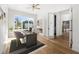 Bright home office with hardwood floors and built-in shelving at 2251 Old Atlanta Rd, Cumming, GA 30041