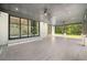 Covered patio with ceiling fan and access to backyard at 2251 Old Atlanta Rd, Cumming, GA 30041