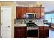 Kitchen with stainless steel appliances and granite countertops at 1056 S Creek S Dr, Villa Rica, GA 30180