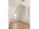 Bright bedroom with hardwood floors and high ceilings at 1180 Lupo Loop, Chattahoochee Hills, GA 30268