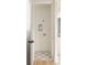Small laundry room with checkerboard floor and built-in shelving at 1180 Lupo Loop, Chattahoochee Hills, GA 30268