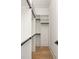 Spacious walk-in closet with ample shelving and hanging rods at 1180 Lupo Loop, Chattahoochee Hills, GA 30268