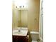 Simple bathroom with vanity, toilet, and mirror at 6398 Shadow Sq, Lithonia, GA 30058