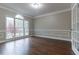Home office with hardwood floors and built-in shelving at 1510 Natchez Way, Grayson, GA 30017
