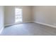 Well-lit bedroom with carpet and ample closet space at 1510 Natchez Way, Grayson, GA 30017