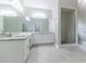 Elegant bathroom with double vanity, granite countertops, and walk-in shower at 1510 Natchez Way, Grayson, GA 30017