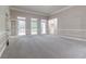 Bright living room with hardwood floors and neutral walls at 1510 Natchez Way, Grayson, GA 30017