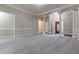 Spacious living room with hardwood floors and neutral walls at 1510 Natchez Way, Grayson, GA 30017