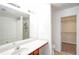 Bathroom with soaking tub, double vanity, and walk-in closet at 2158 Executive Dr, Duluth, GA 30096